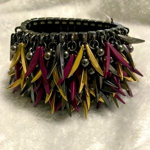 Multicolor dangling stretch bracket.